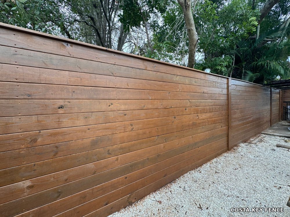 Horizontal wood privacy fence installed by Costa Key Fence at a residential property near Sarasota, Florida