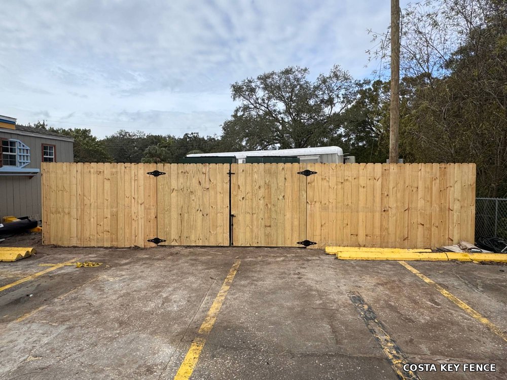Wood picket double gate installed by Costa Key Fence near Sarasota, Florida